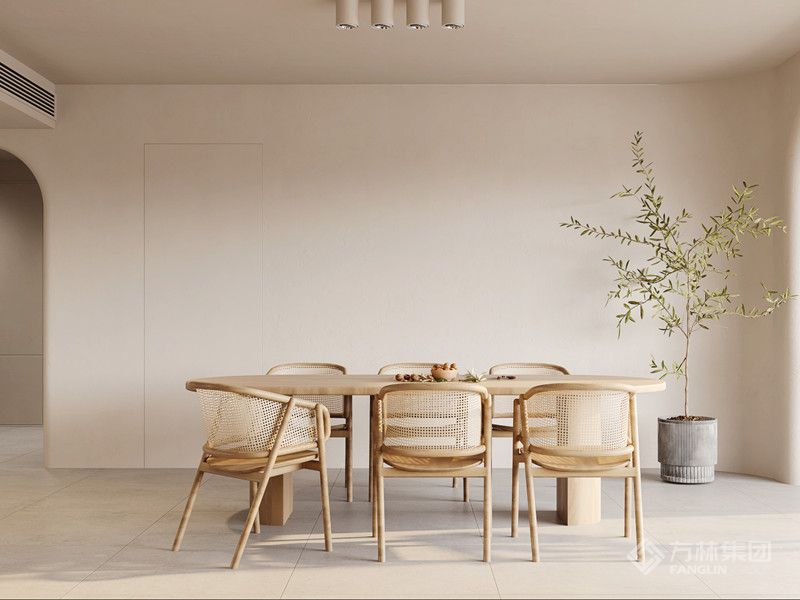 餐厅和客厅一体化,使空间更加通透,藤编的座椅以及木制的餐桌就作为呈现自然感的元素